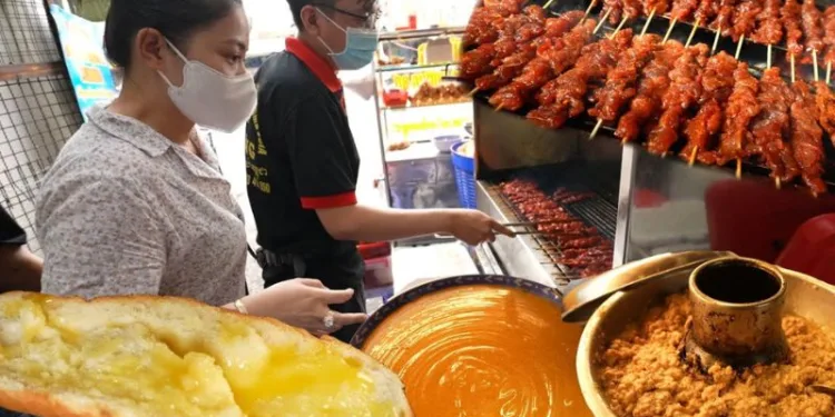 Review A Tùng bánh mì bò nướng bơ campuchia